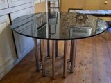a glass table with a glass top in a room