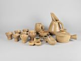an image of a group of pottery items sitting on a table