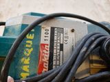 a close up of a machine with wires attached to it