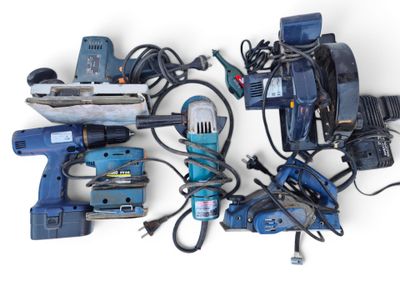 many different types of power tools on a white surface
