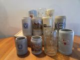 many different types of coffee mugs on the table