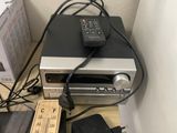 a picture of a stereo system and a ruler on a desk