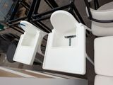 two seats that are attached to the back of a boat