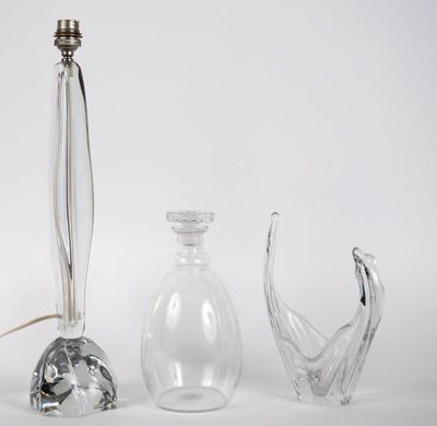 three glass vases sitting next to each other on a white surface
