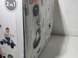 a cardboard box with a picture of a boy riding a scooter