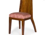 an image of a wooden chair with a pink upholstered seat