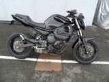 a motorcycle that is parked in a parking lot