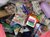 a pile of toys and games in a plastic bag