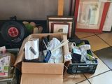 a box full of items sitting on the floor in a room