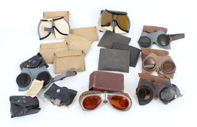 many different types of glasses and other items on the table