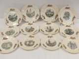many plates with different designs on them on a table
