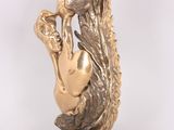 statue of a woman holding a vase in her hands on a marble base