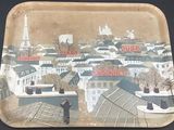 a tray with a picture of a city on it