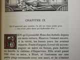 an open book with a picture of a woman sitting on a bed