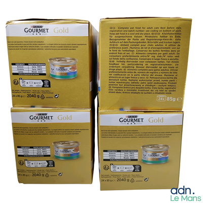 deux boîtes de nourriture pour chat « Gourmet Gold » empilées l'une sur l'autre