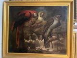 a painting of two parrots and a bird in a gold frame