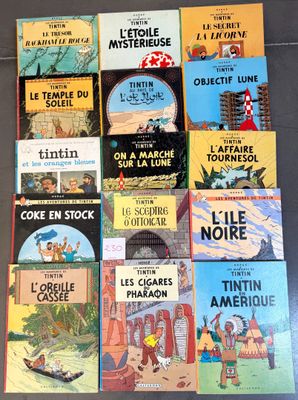 several children ' s books are lined up on a table