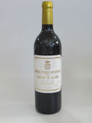 a bottle of wine that is sitting on a table