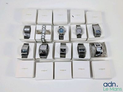 a lot of watches that are sitting on a table