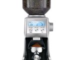 the coffee grinder has a digital display on the side of it