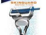 a close up of a razor on a blue and white background
