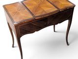 an image of a wooden desk with a drawer on it