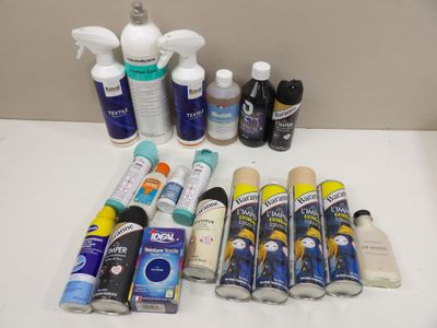 many different types of cleaning products laid out on the counter