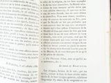 an open book that has a picture of a cat on it