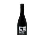 a bottle of wine with a picture of a person on it
