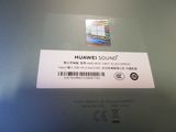 a label on the back of a laptop that says huawei sound