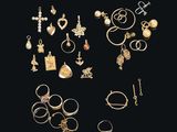 a collection of gold jewellery including rings, bracelets and rings