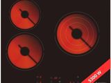 an image of a black and red stove top with three burners