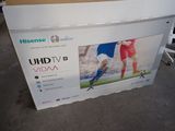 the box has a picture of a soccer player on it