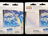 two packs of pokemon trading cards on a black background