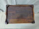 a small wooden box that is sitting on a table