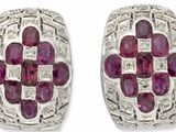 une paire de boucles d'oreilles en rubis et diamants