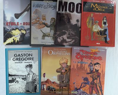 un grand nombre de livres posés sur une table