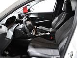a picture of the inside of a car with the driver ' s seat up