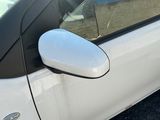 a close up of a car ' s side view mirror