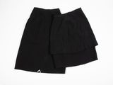 a pair of black shorts on a white background