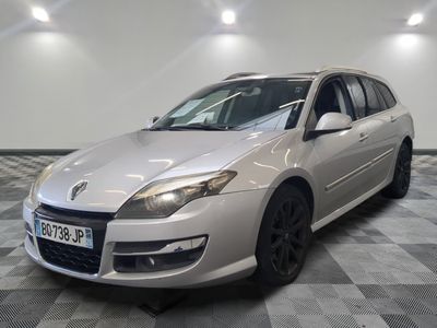 a picture of a white car parked in a garage