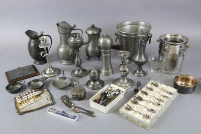 a lot of silver items that are on the table