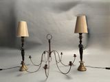 three lamps that are sitting on a table