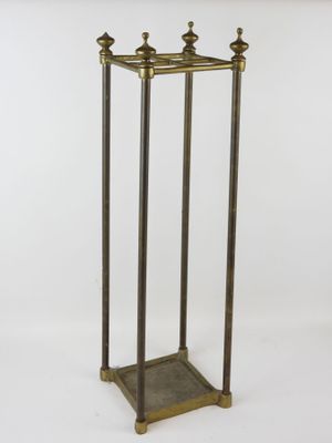 an image of a tall metal stand with four legs