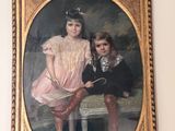 a painting of a boy and a girl on a mantle