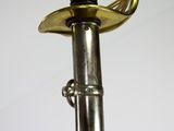 a close up of a metal pole with a light on top of it