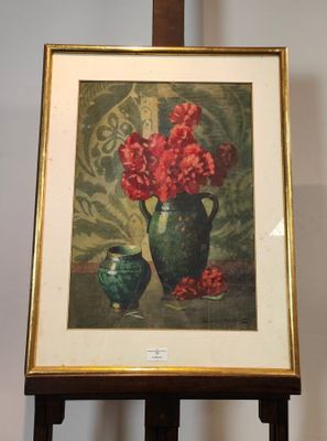 une photo d'un tableau représentant des fleurs dans un vase, posé sur un chevalet