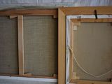 two frames with a rope hanging from them on the wall