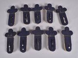 six blue mickey mouse hair clips on a white surface