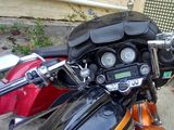 a close up of a motorcycle parked in front of a building